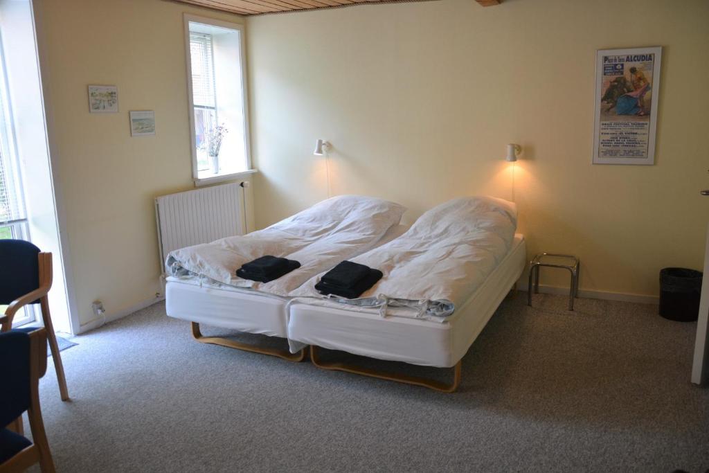 Postel nebo postele na pokoji v ubytování Gunneruphus Bed & Breakfast