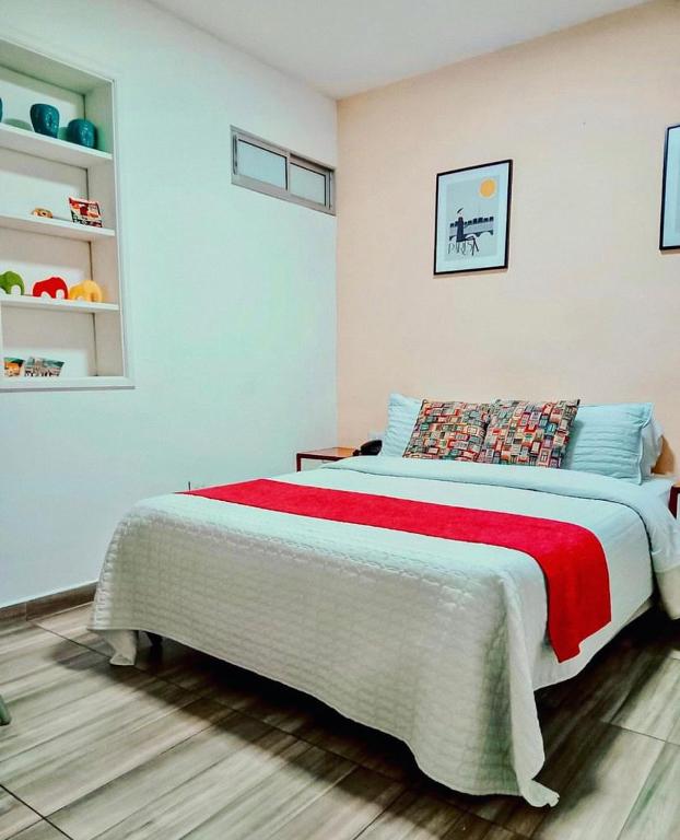 Postel nebo postele na pokoji v ubytování Hotel Maceo 55 - Colonial Inn