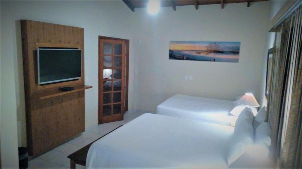 Cama ou camas em um quarto em Hiu Hotel