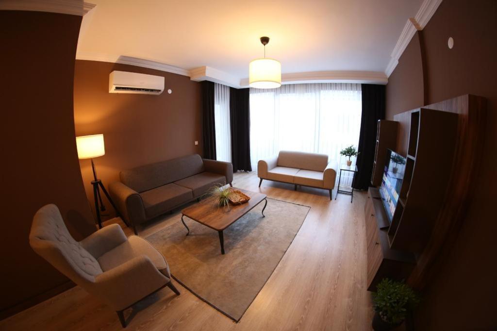 Posezení v ubytování Yücemek Apart