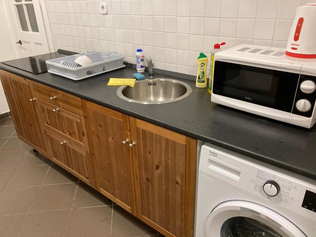 Kuchyňa alebo kuchynka v ubytovaní Roland Apartment Zuglo 2