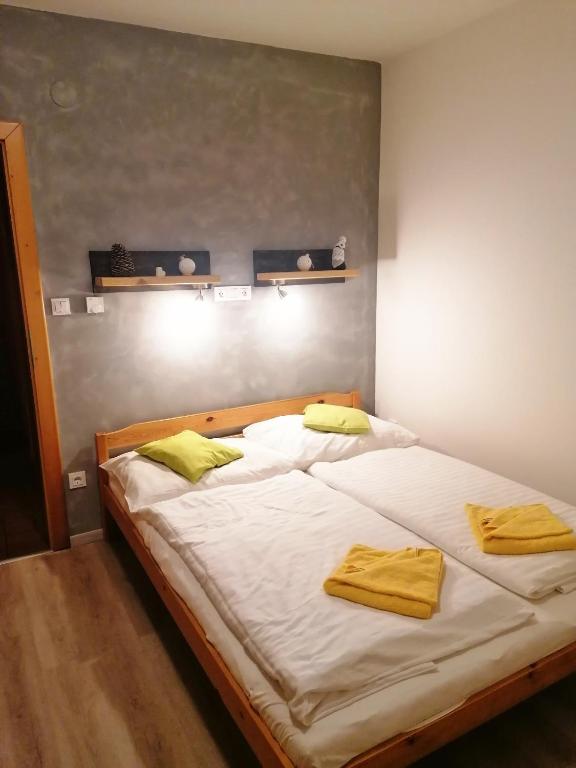 Postel nebo postele na pokoji v ubytování Chalupa Sluníčko