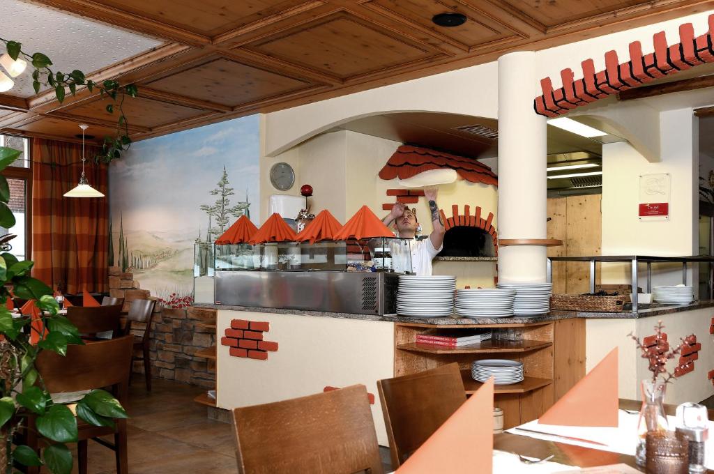 Reštaurácia alebo iné gastronomické zariadenie v ubytovaní Tre Soli Appartements Restaurant