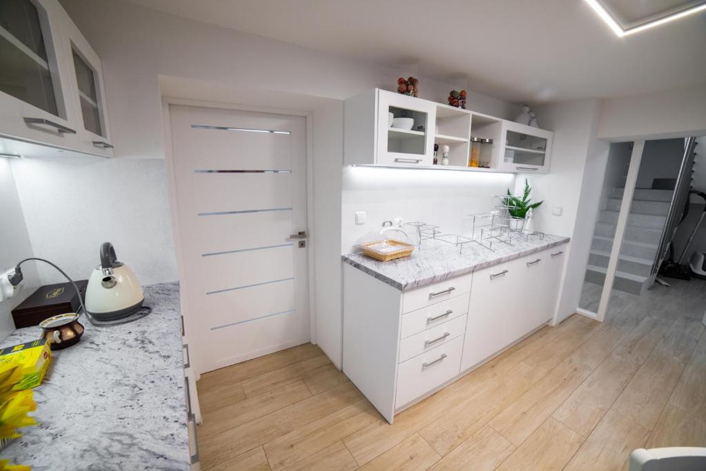 Kuchyň nebo kuchyňský kout v ubytování Apartamenty Wisła Centrum