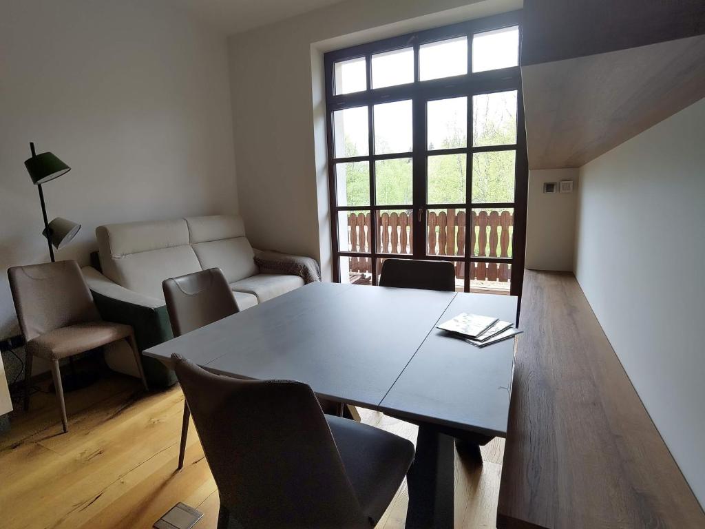 Posezení v ubytování Apartmán Strunzova pila Kvilda 203