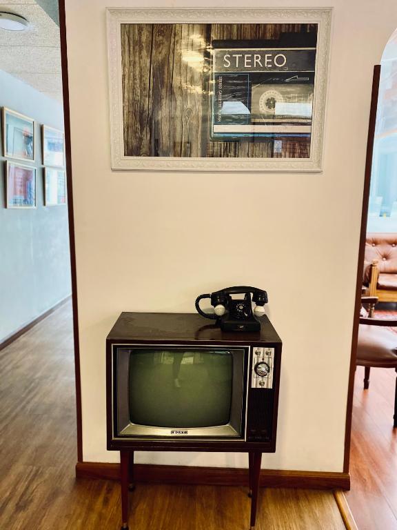 TV a/nebo společenská místnost v ubytování Hotel Maceo Chico