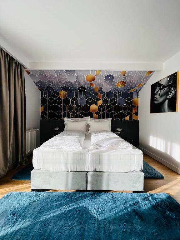 Una cama o camas en una habitación de Boutique Villa Isabelle