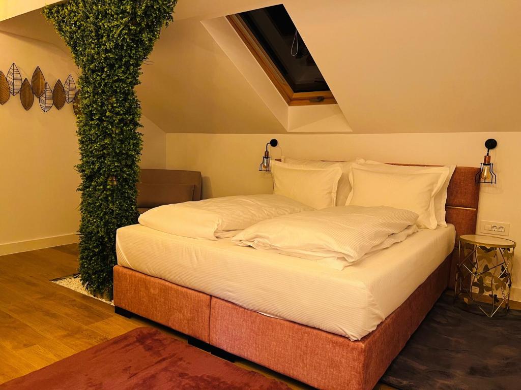 Una cama o camas en una habitación de Boutique Villa Isabelle