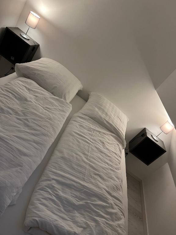 Postel nebo postele na pokoji v ubytování Mimi's Ostseeglück