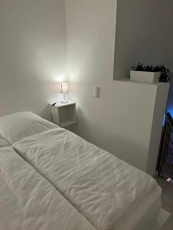 Postel nebo postele na pokoji v ubytování Mimi's Ostseeglück