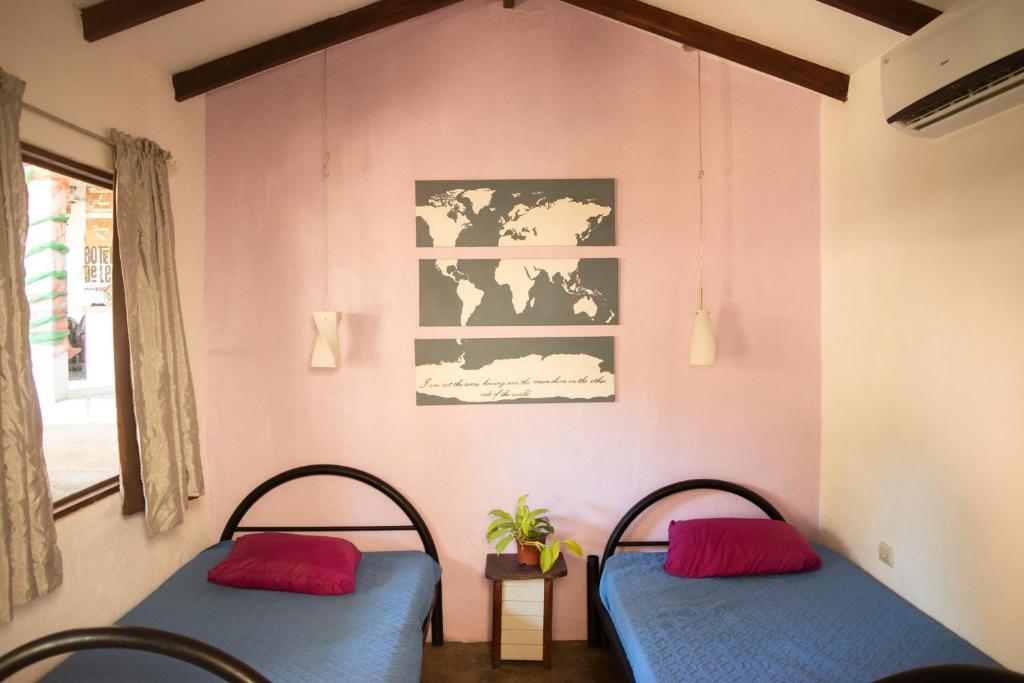 Postel nebo postele na pokoji v ubytování Hostel La Botella de Leche - Tamarindo
