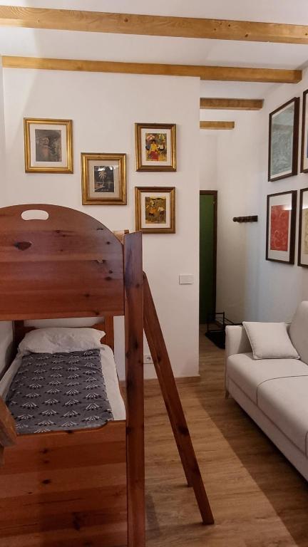 A bed or beds in a room at La Casa Degli Artisti - presso Sussy Residence