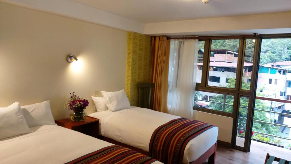 Postel nebo postele na pokoji v ubytování Hotel Pucara Machupicchu