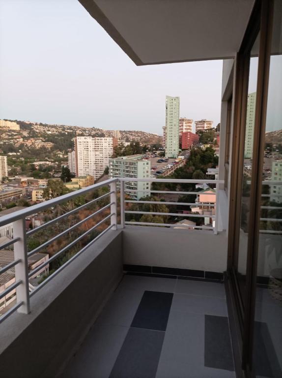 a balcony with a view of a city at Viña Parque Urbano in Viña del Mar