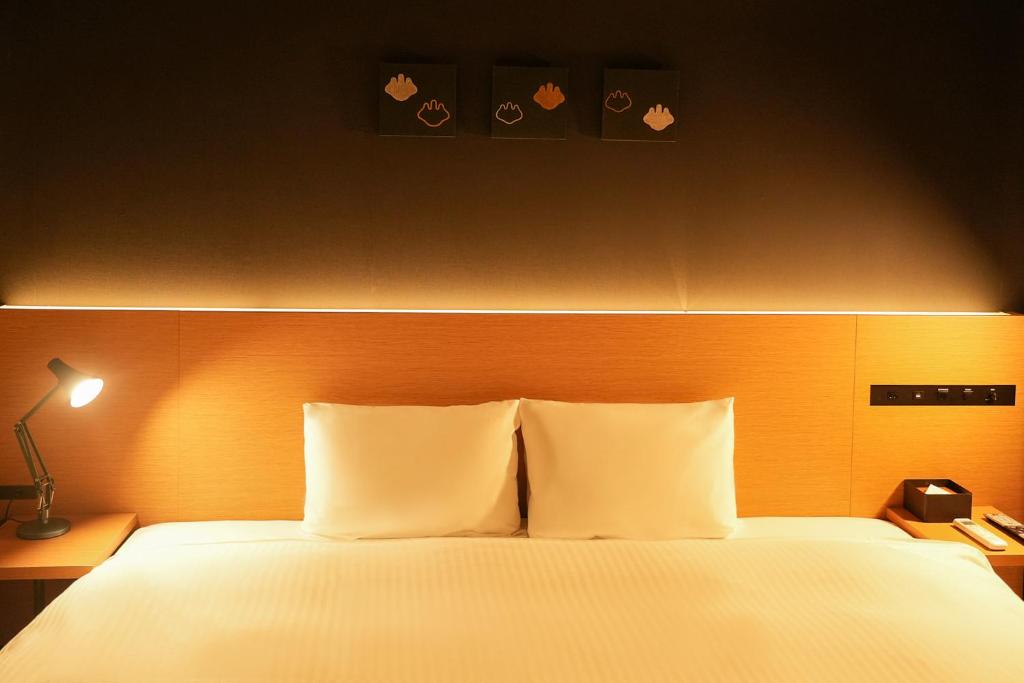 Postel nebo postele na pokoji v ubytování N Plus Hotel Akihabara