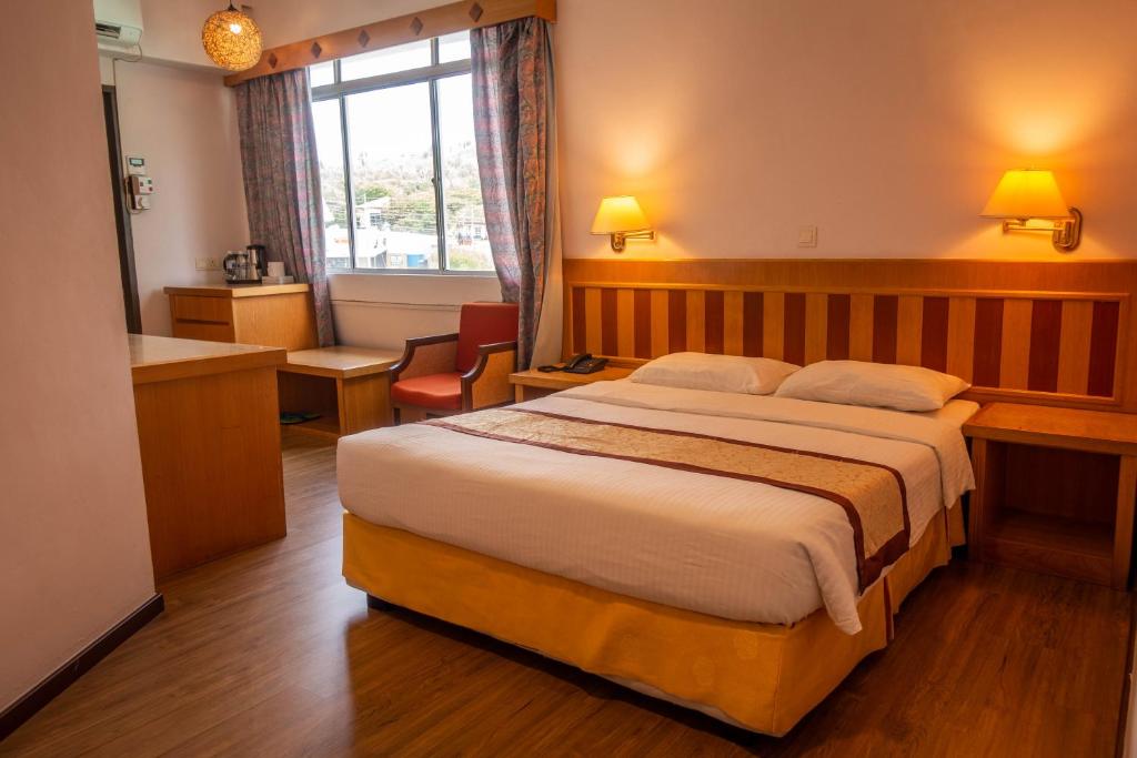 Postel nebo postele na pokoji v ubytování Miri Hotel