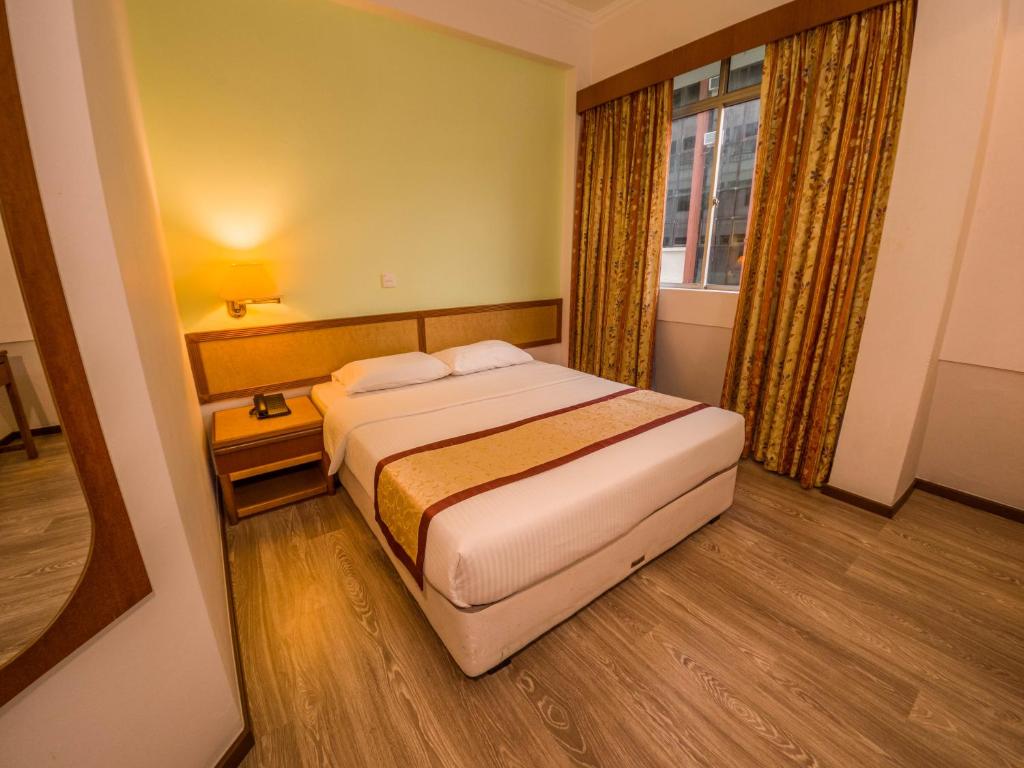Postel nebo postele na pokoji v ubytování Miri Hotel