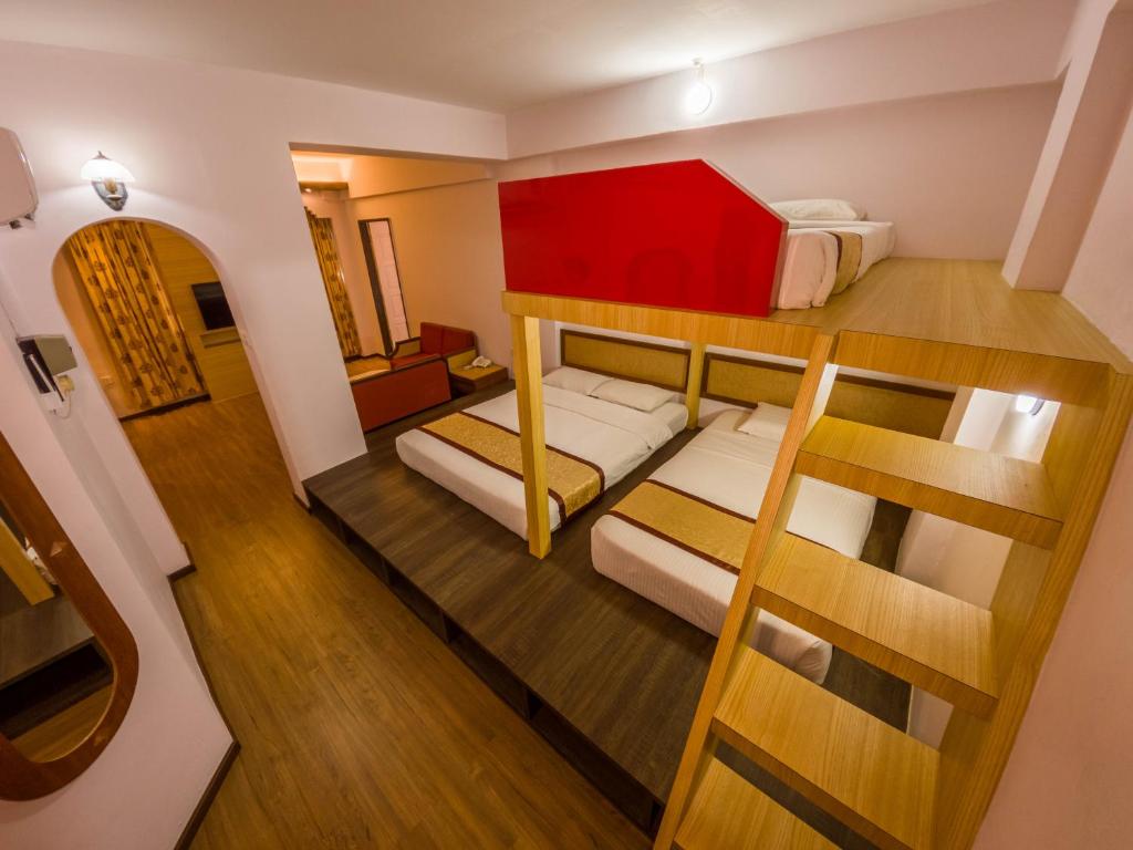 Postel nebo postele na pokoji v ubytování Miri Hotel