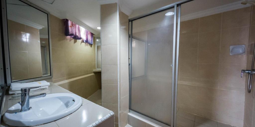 Koupelna v ubytování Miri Hotel