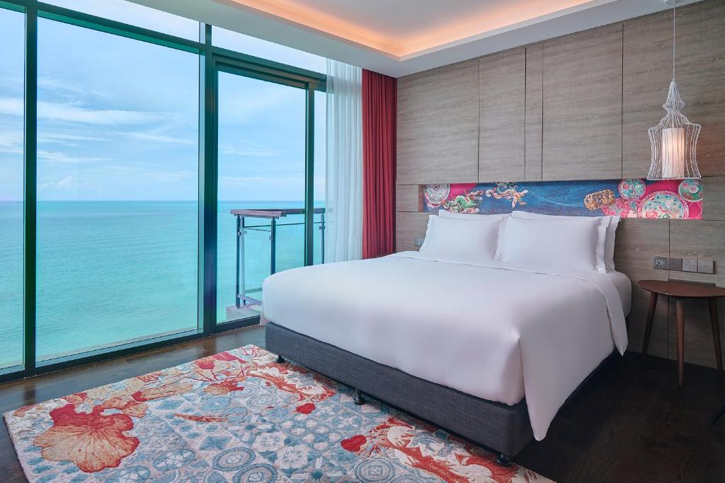 Postel nebo postele na pokoji v ubytování Angsana Teluk Bahang, Penang