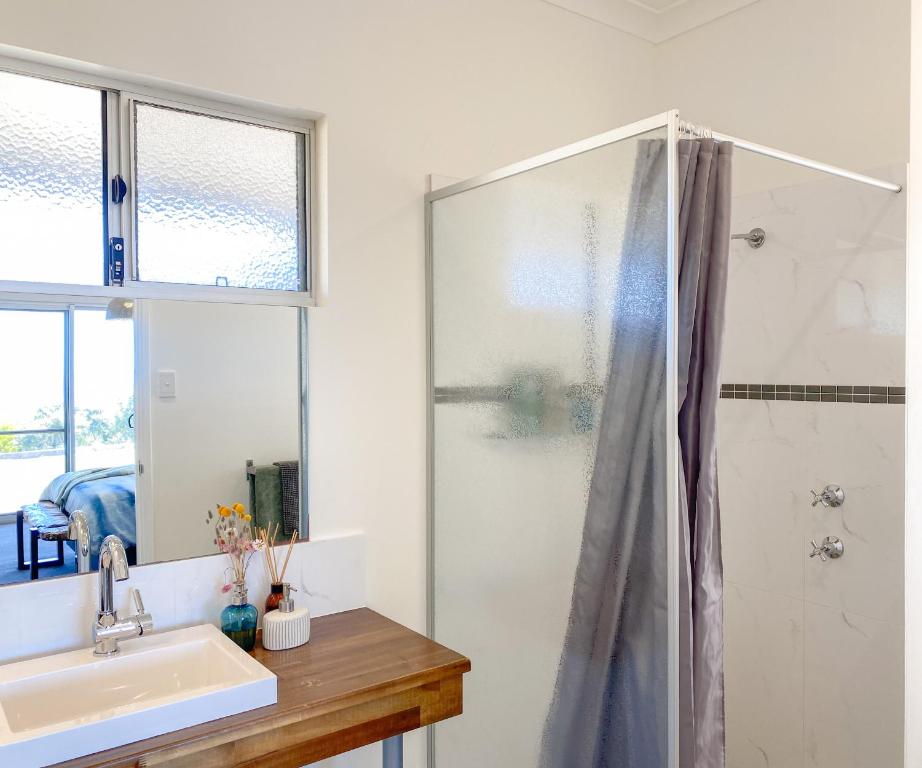 a bathroom with a shower and a sink at Bremer Bay B&B in Bremer Bay