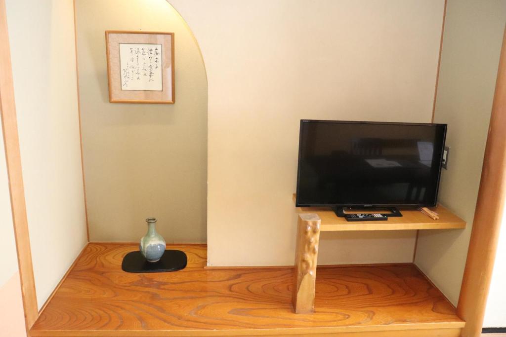 TV a/nebo společenská místnost v ubytování Hotel Ichii