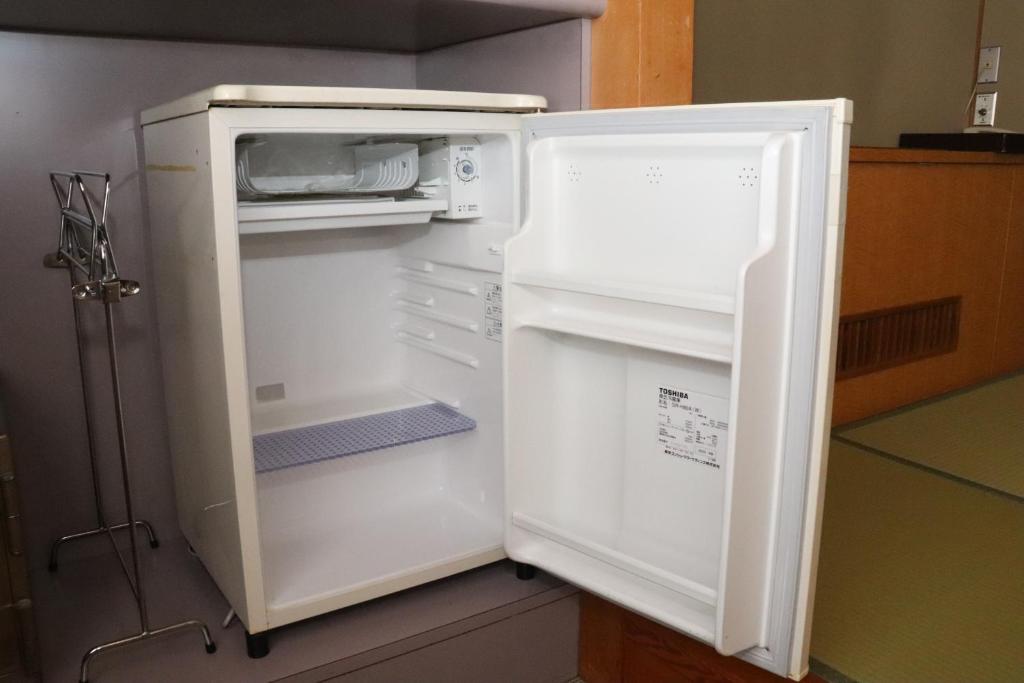 Kuchyň nebo kuchyňský kout v ubytování Hotel Ichii