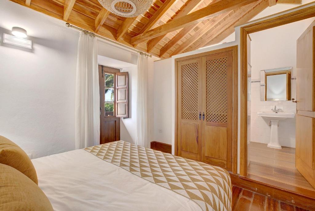 Postel nebo postele na pokoji v ubytování Casa Rural Dragomar