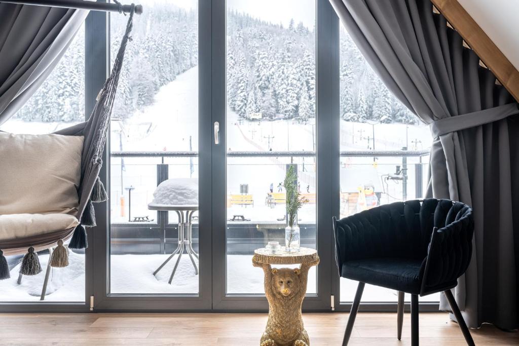 Posedenie v ubytovaní STACJA NOSAL Apartamenty