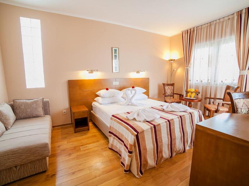 Postel nebo postele na pokoji v ubytování Hotel Petrovac