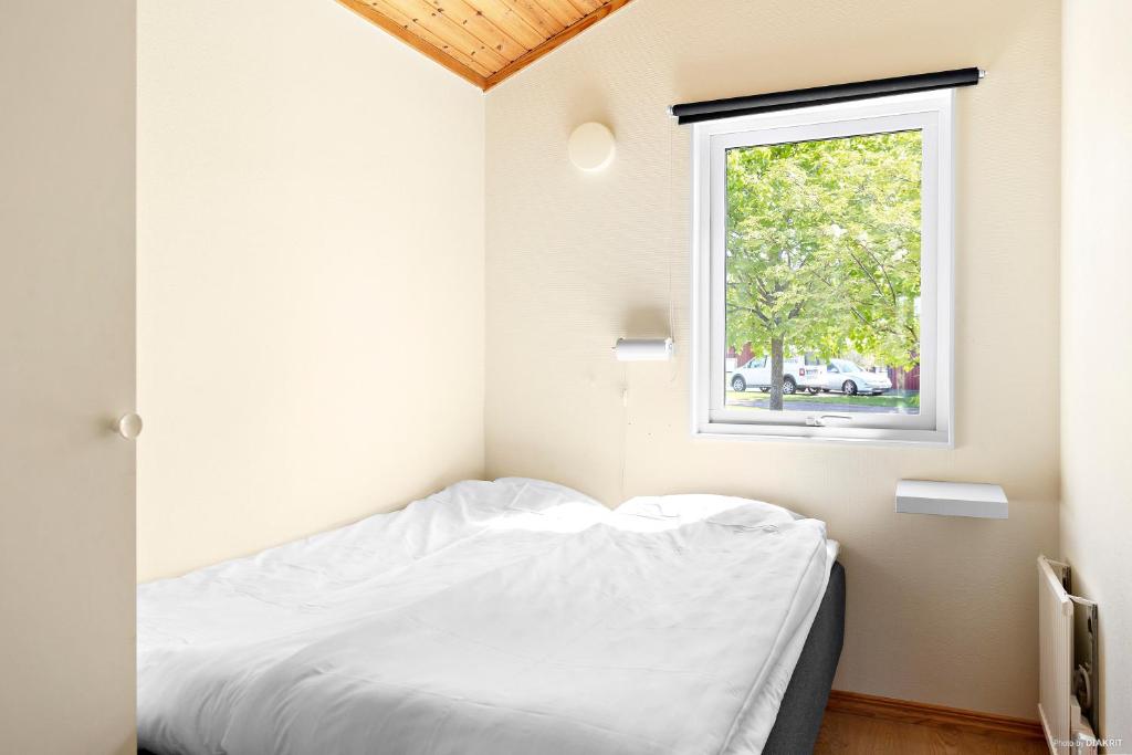 Postel nebo postele na pokoji v ubytování First Camp Gränna - Vättern