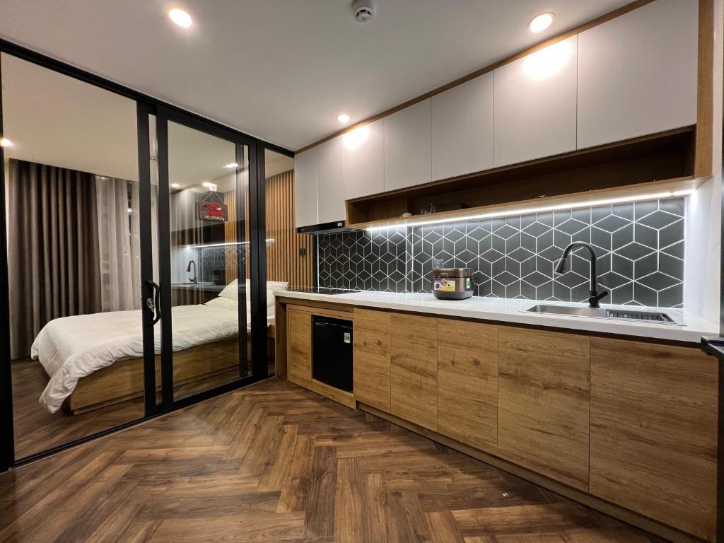 Nhà bếp/bếp nhỏ tại LE CIMENT - Apartment Hotel