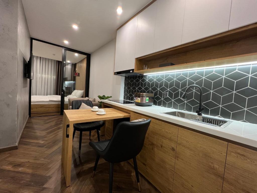 Nhà bếp/bếp nhỏ tại LE CIMENT - Apartment Hotel