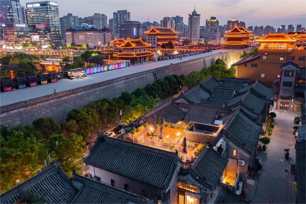 an overhead view of a city at night at Joke Inn in Xi'an