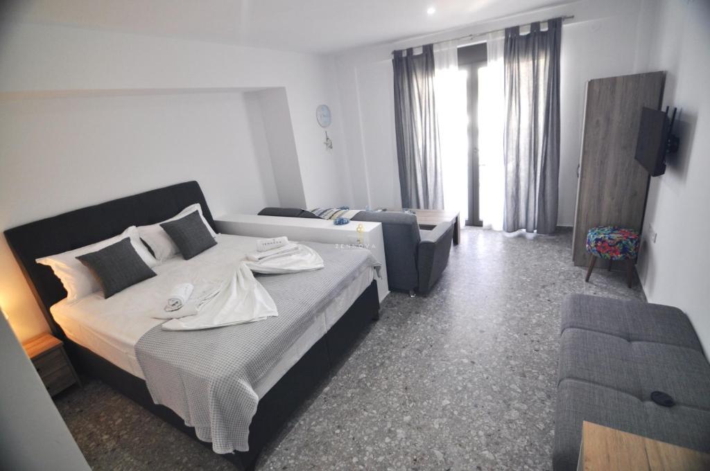 Posteľ alebo postele v izbe v ubytovaní Zennova Sirene Luxury Studios