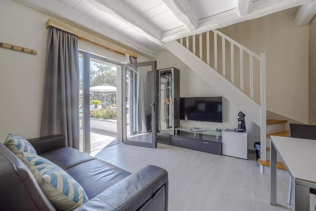 TV a/nebo společenská místnost v ubytování Luxury Zen