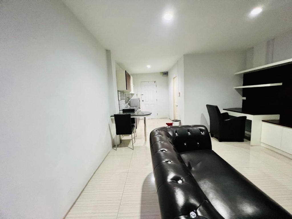 Posezení v ubytování INN Kham Apartment