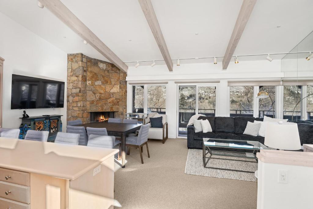 a living room with a couch and a fireplace at Standard Three Bedroom - Aspen Alps #406 in Aspen