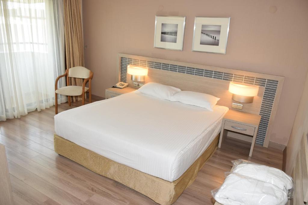 Postel nebo postele na pokoji v ubytování Pam Thermal Hotel Clinic & Spa