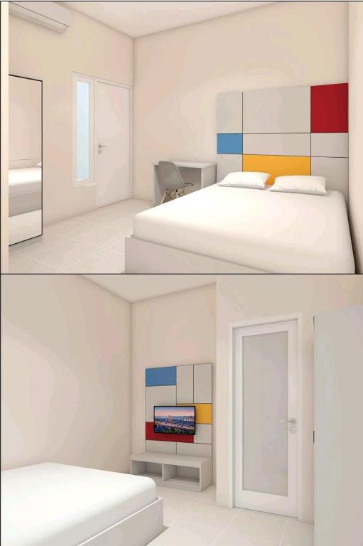 Postel nebo postele na pokoji v ubytování Ndalem Kraton Hotel