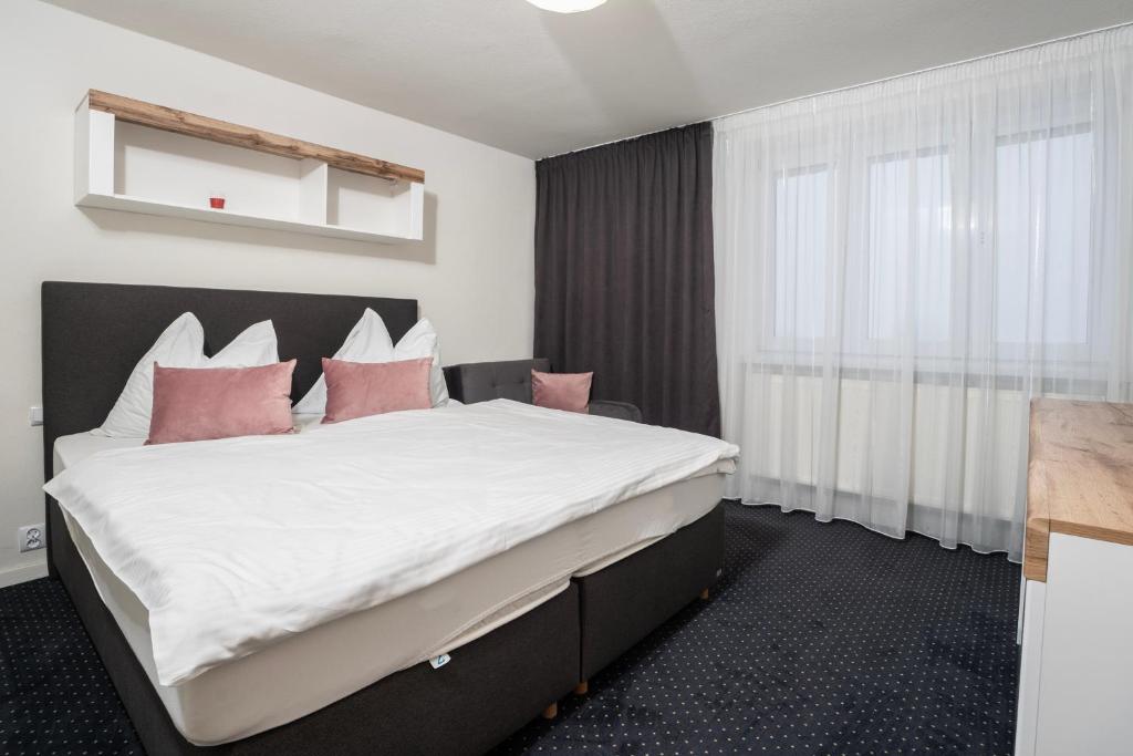 A bed or beds in a room at Ubytovanie u Maťka a Kubka