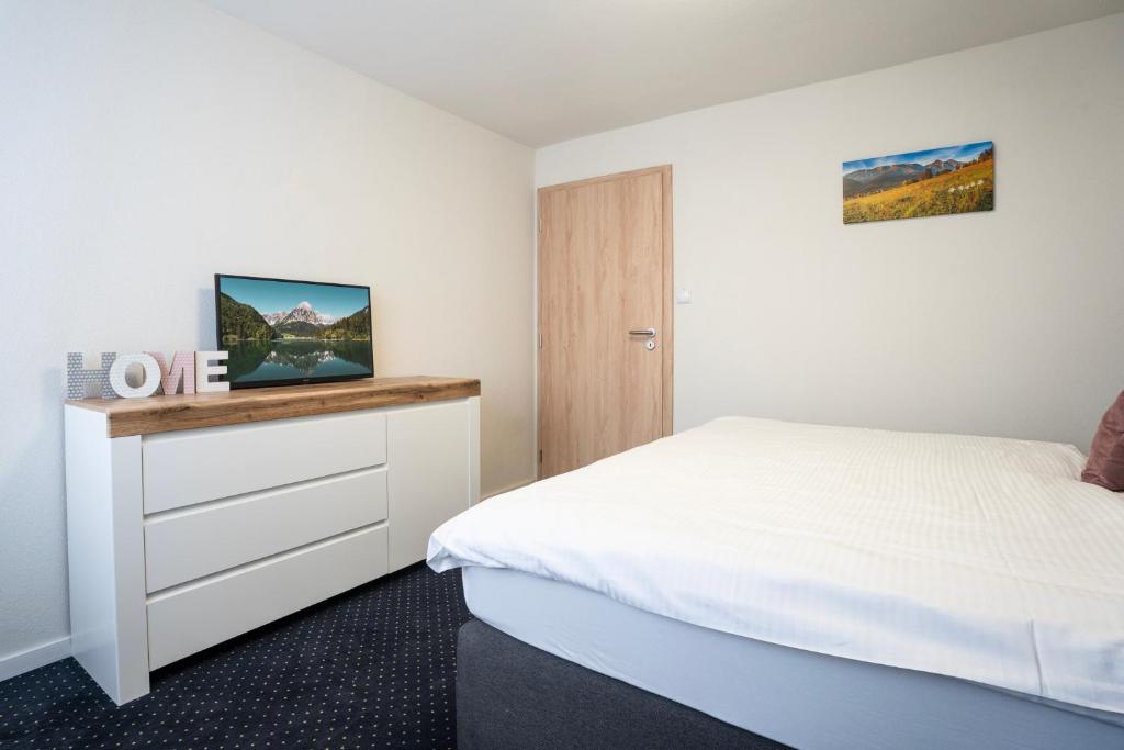 A bed or beds in a room at Ubytovanie u Maťka a Kubka