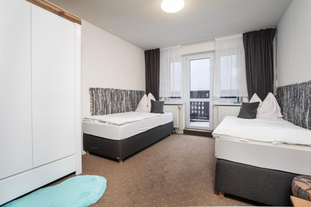 A bed or beds in a room at Ubytovanie u Maťka a Kubka