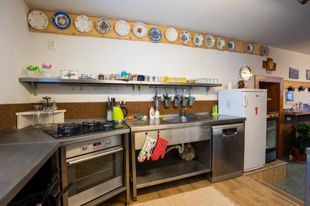 A kitchen or kitchenette at Ubytovanie u Maťka a Kubka