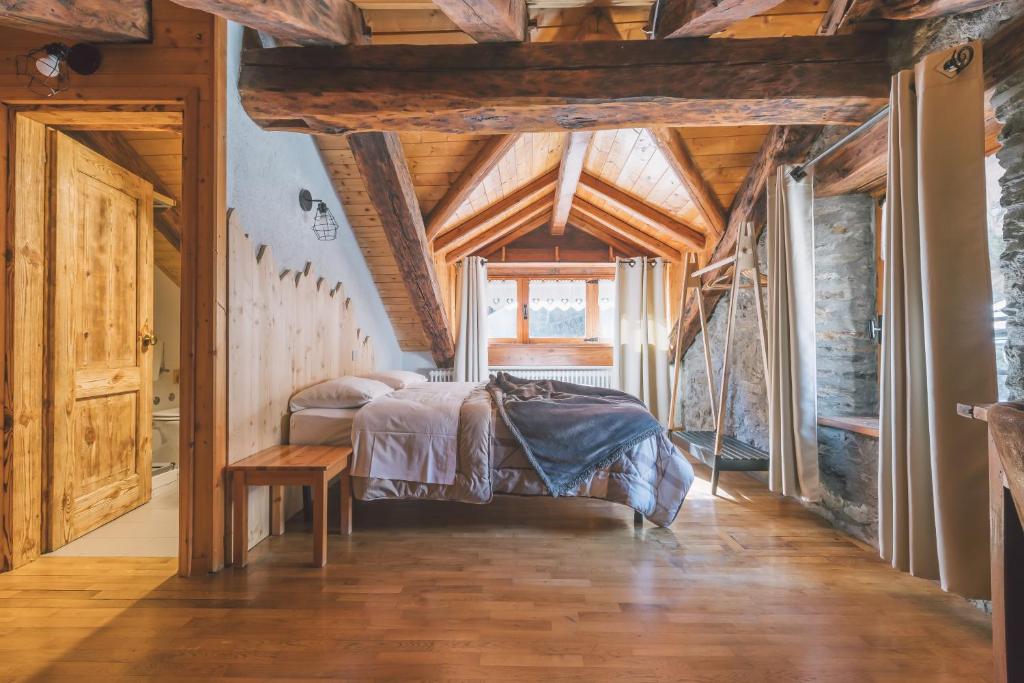 Cama o camas de una habitación en Suisse Locanda di Borgo