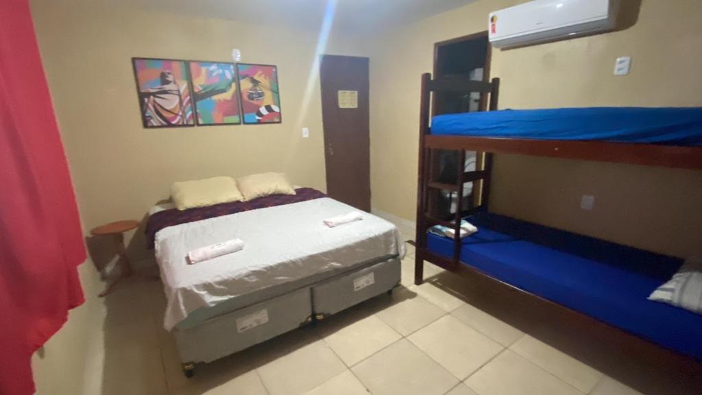 Postel nebo postele na pokoji v ubytování RioSlz Hostel