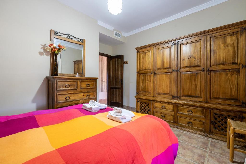 Posteľ alebo postele v izbe v ubytovaní Hacienda La Carreta