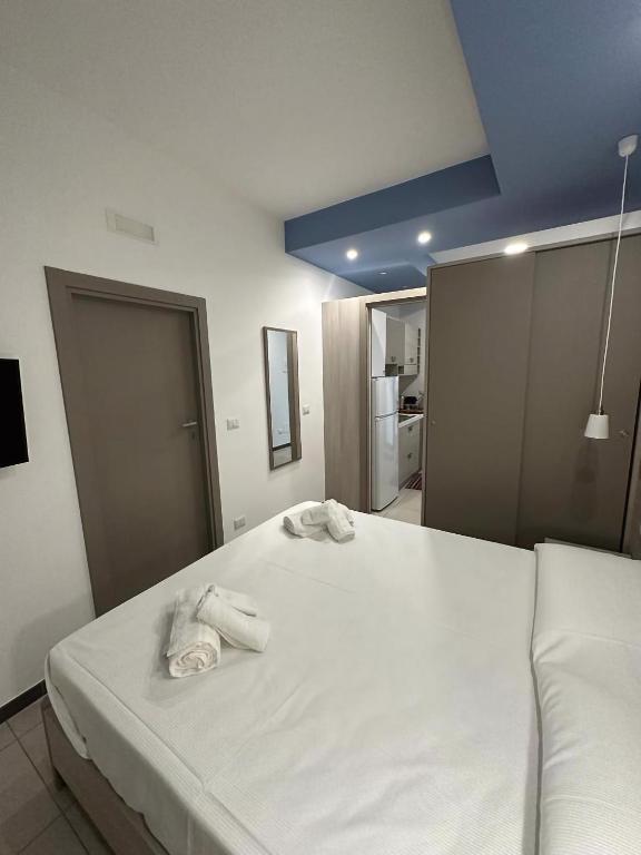A bed or beds in a room at Notti Magiche