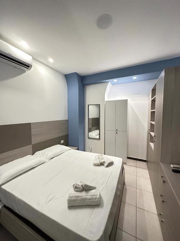 A bed or beds in a room at Notti Magiche