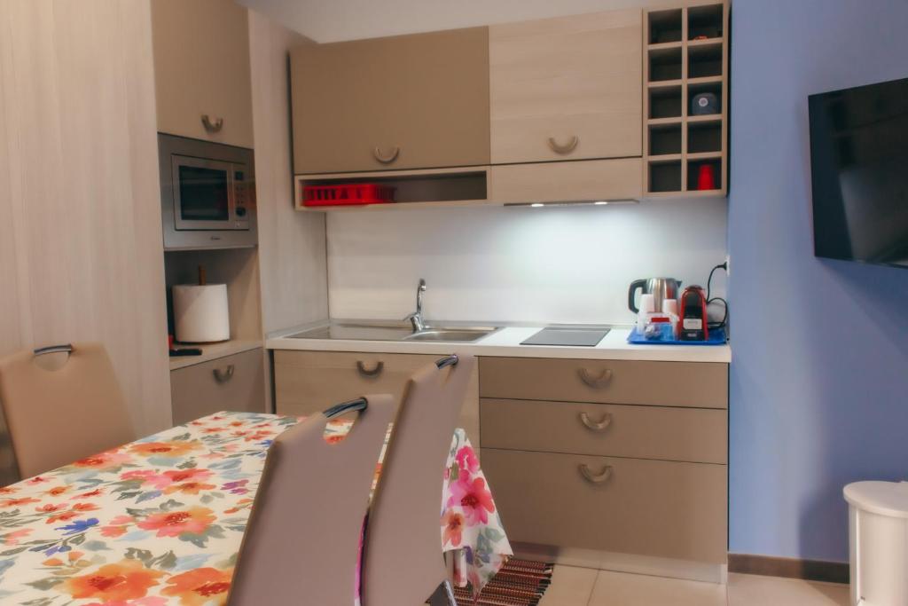 A kitchen or kitchenette at Notti Magiche